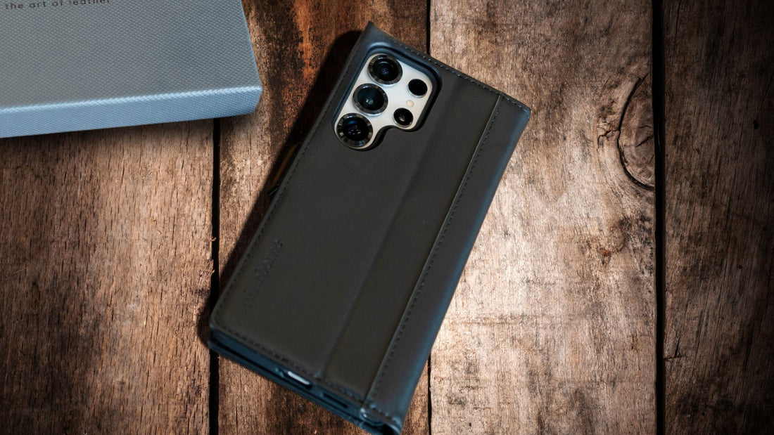 black leather S25 Ultra flip case wooden background