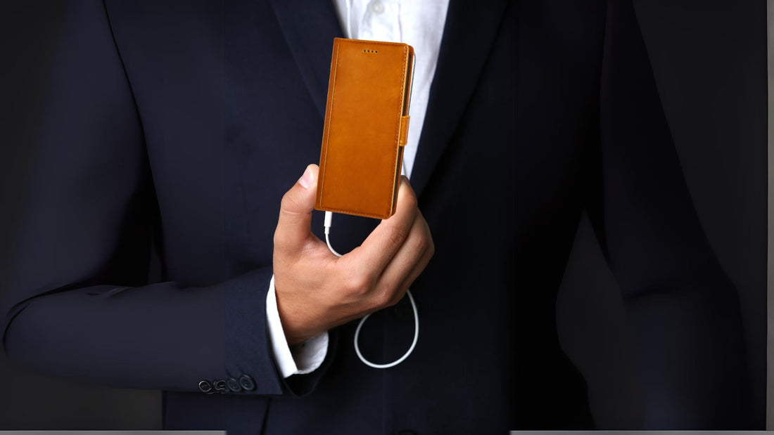Man in black suit carrying wallet leather phone case folio design