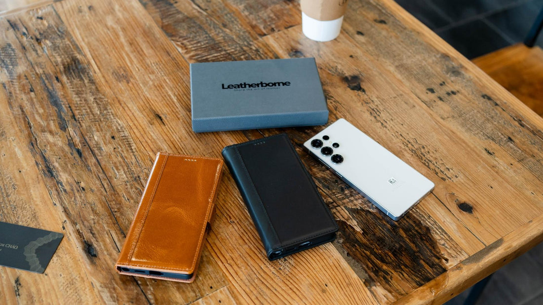galaxy S25 Ultra brown and black leather wallet cases on top of table beside a cup of coffee