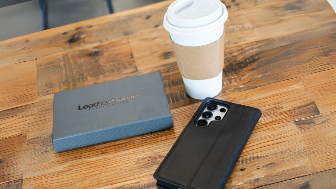 Samsung Galaxy S25 Ultra leather wallet case with coffee cup on the side, wooden table