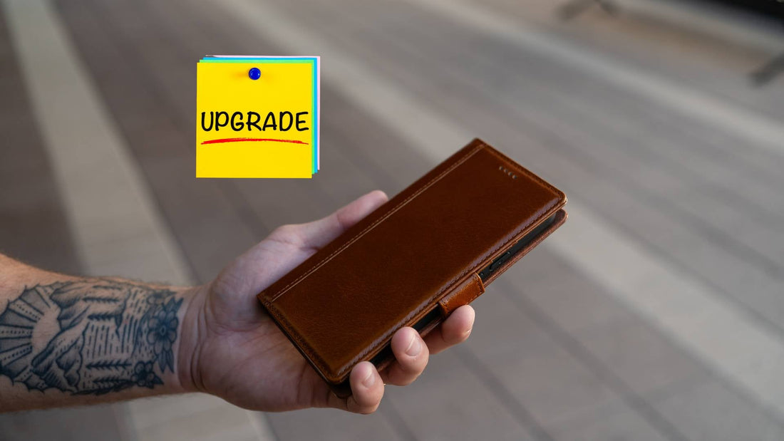 close up photo of tattoed hand with Pixel 9 Pro XL Full Grain Leather Wallet Case with partial handmade details