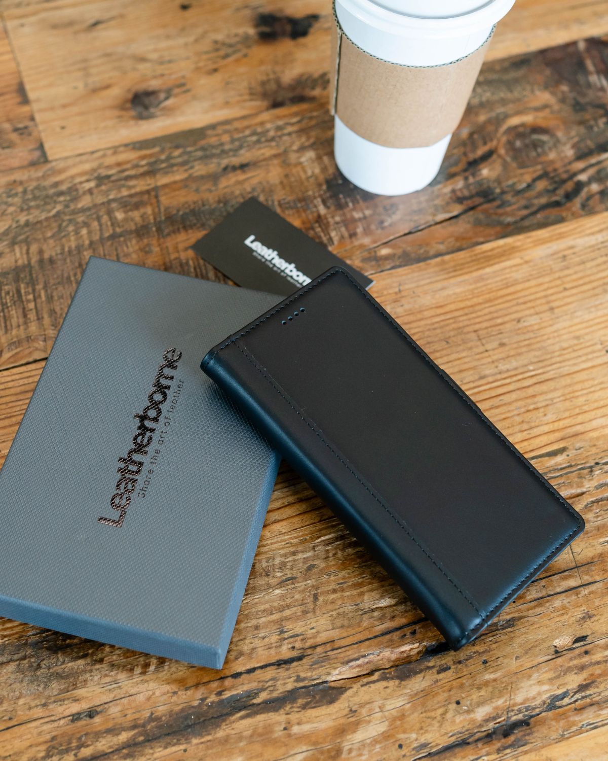 a close up shot of the black full grain leather samsung galaxy s25 ultra folio cover on the table
