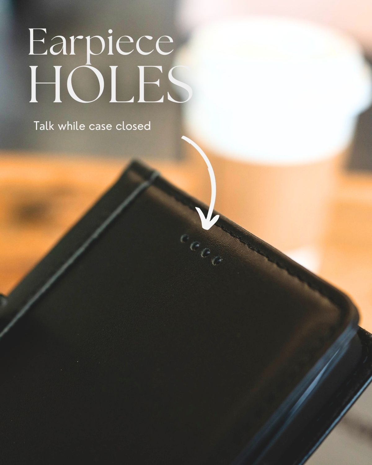 a close up shot of the earpiece hole design of the full grain leather folio case for samsung galaxy s25 ultra in black 
