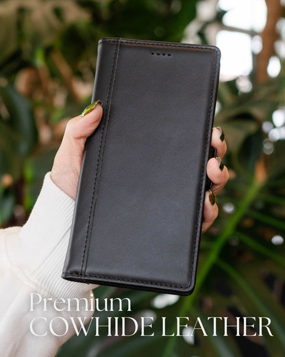 a female hand holding the black samsung s25 ultra leather flip cover
